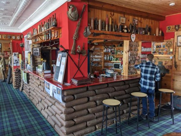 The bar at the Café Le Tommy in Pozieres France. A warm setting and a generous meal after a crisp morning on the battlefields surrounded by a display of relics